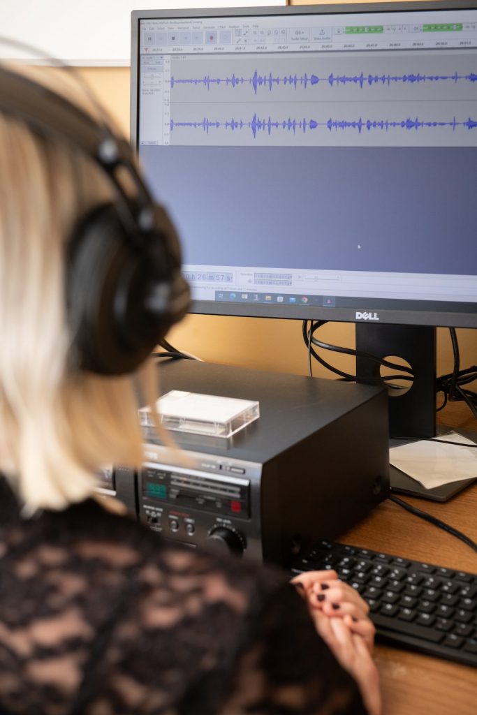 a student using a language audio program in the Robertson Library